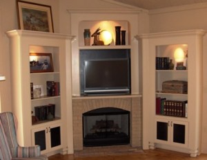 Living room with fireplace and built-in shelves